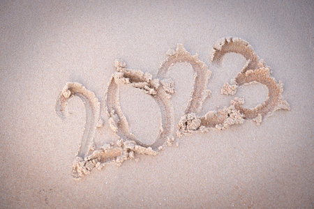2023 happy New Year coming concept. White waves are lapping towards the shore