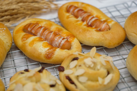 Fresh fragrant bread and bun on the table with copy space. Food conceptの写真素材