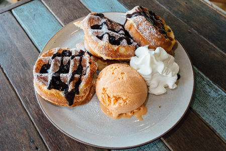 Waffle with ice cream and wiping creamの写真素材