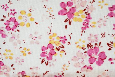 White cloth texture background with pink flowers stripedの写真素材