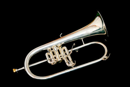 Silver fluegelhorn with mouthpiece isolated on blackの写真素材