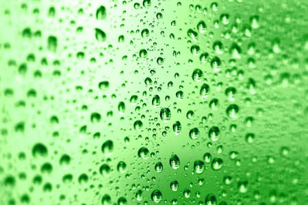 Abstract with water drops on a glass surfaceの写真素材