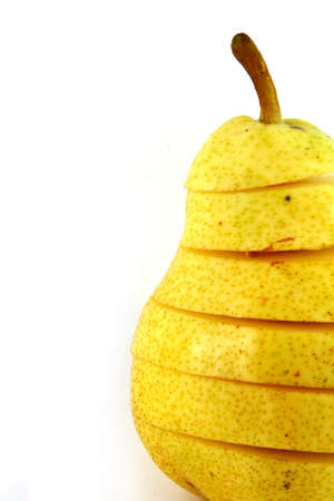 Single pear cut in sections with text spaceの写真素材