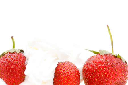 Strawberry and cream close-up on whiteの写真素材