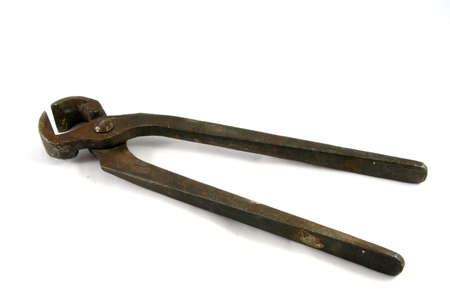 Old rusty pliers with long levers isolated on whiteの写真素材