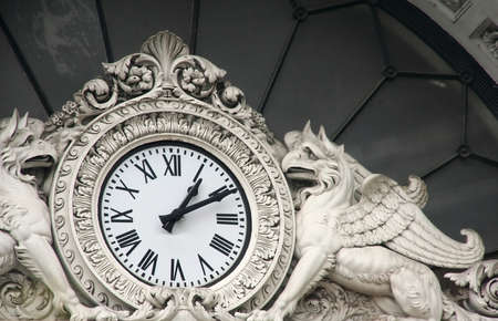 Old medieval clock in Italy, Milanoの写真素材