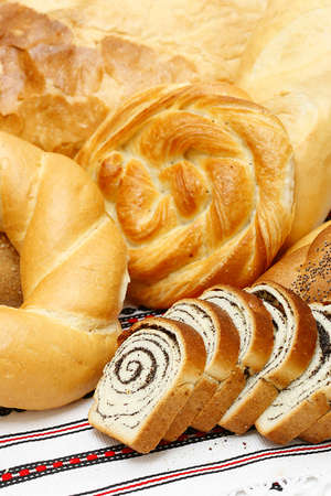 Bread, loaf, cake, baton, crescent on white 