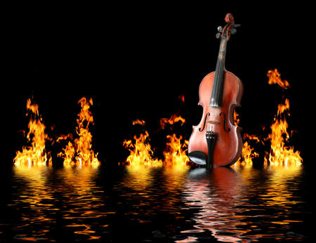Old wooden violin in flames reflecting in water waves in nightの写真素材