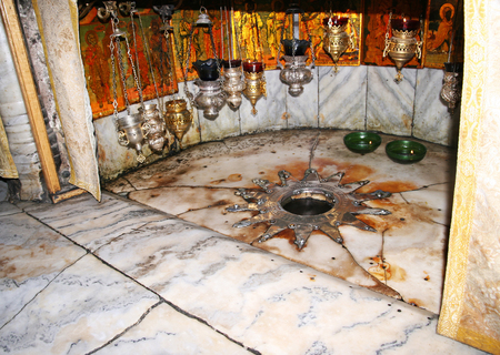 A silver star marks the traditional site of the birth of Jesus in Bethlehem's Church of the Nativity, Bethlehem, Israelのeditorial素材