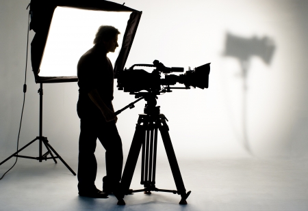Cameraman silhouette and cameras.の写真素材