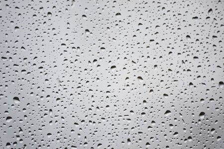 A background picture of a rainy windowの写真素材