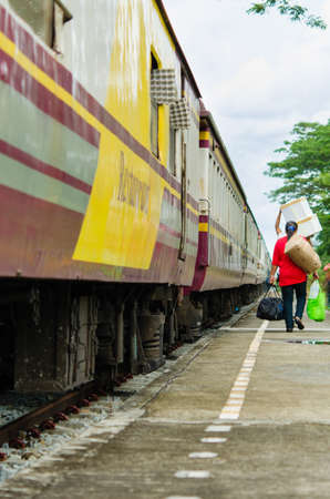 person go home with train  at Kan Tang station in Thailand
