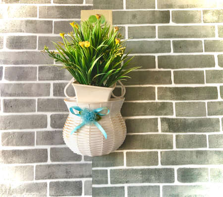 Flowers in the house is beautiful on wallの写真素材