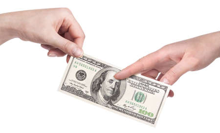 Hand giving money to other hand isolated  on white background