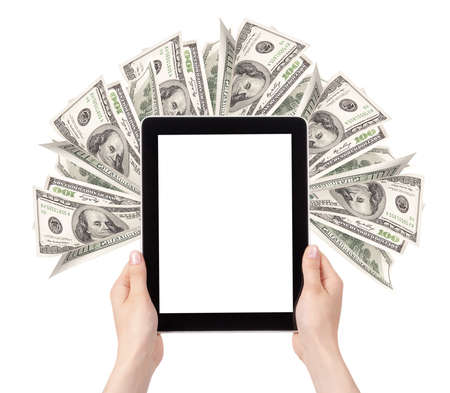 lot of money on a Tablet pc screen with woman hands isolated on a white backgroundの写真素材