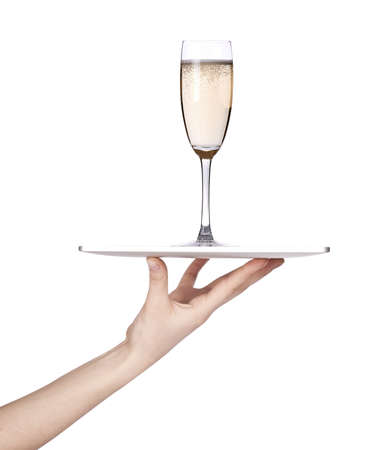 Waitresses hand holding a silver serving tray with champagne  isolatedの写真素材