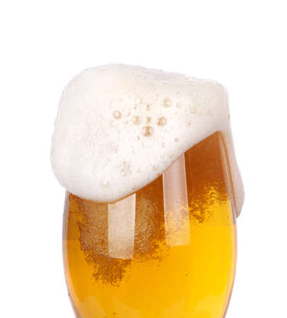 Frosty glass of light beer isolated on a white backgroundの写真素材