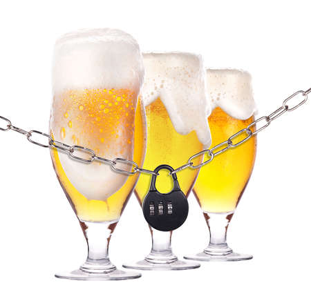 alcoholism concept - background with beer locked on a chain  isolatedの写真素材