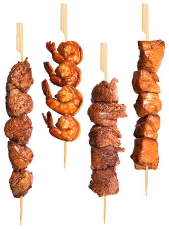 fresh grilled meat dishes set isolated on a white backgroundの写真素材