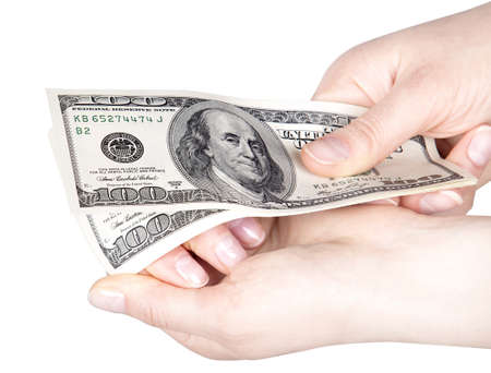 Businessman counts money in hands american hundred dollar bills isolated
