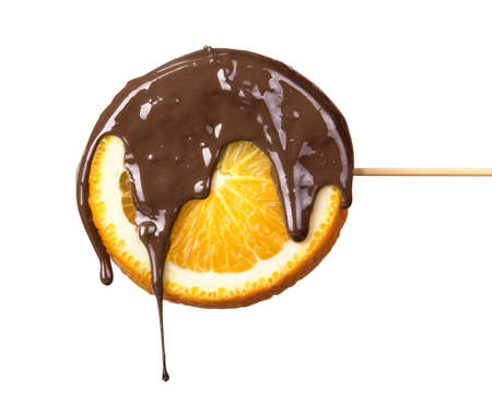 slice of orange with chocolate isolated on a whiteの写真素材
