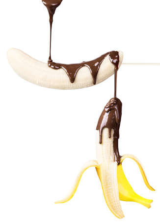 temptation concept  - banana with chocolate isolated on a whiteの写真素材