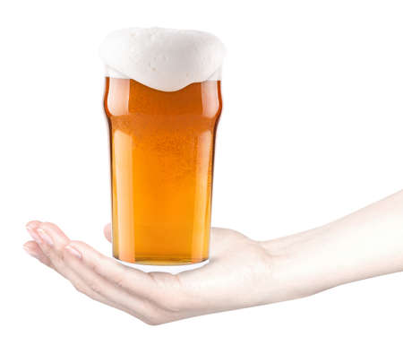 frosty fresh glass of beer with woman hand isolatedの写真素材