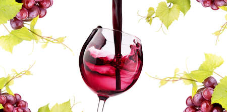 Ripe grapes and  wine glass isolated on white