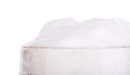 Frosty glass of light beer isolated on a white background