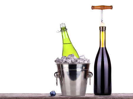 red wine and champagne bottle isolatedの写真素材