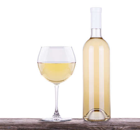 glass of white wine and a bottle isolatedの写真素材