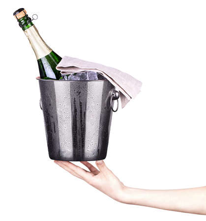 bottle of champagne in ice bucketの写真素材