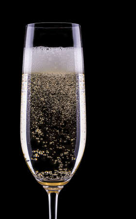 glass of champagne isolated on black backgroundの写真素材