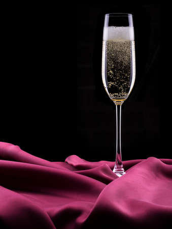 glass of champagne isolated on black backgroundの写真素材