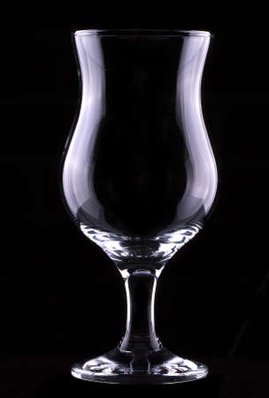 empty glass isolated on a black backgroundの写真素材