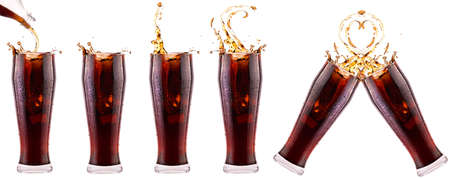 Fresh cola drink background with splash isolated on a whiteの写真素材