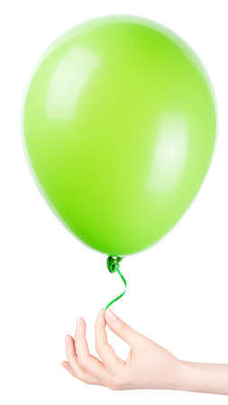 flying balloon with hand isolated on a white backgroundの写真素材