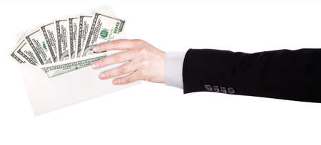 Businessman Hand and money in envelope isolated on white 