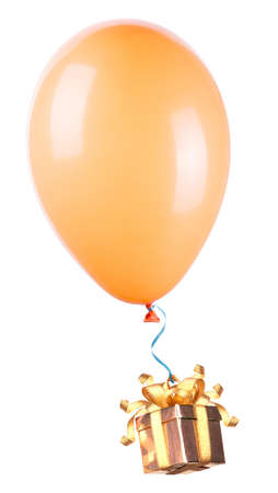 gift hanging on color balloons rising highの写真素材