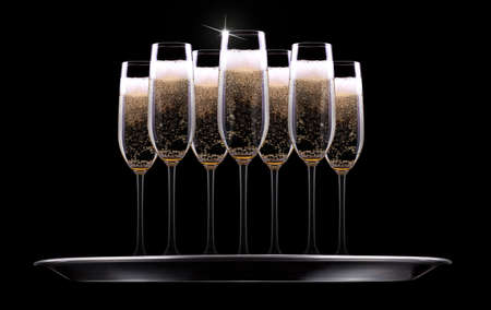 silver tray with champagne glass on black backgroundの写真素材