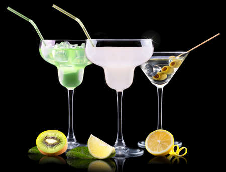 alcohol cocktail set with tasty summer fruits. Berry cooler cocktail, martini, mojito,  Pina Coladaの写真素材