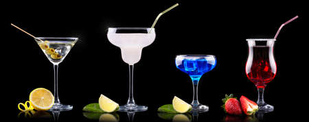 alcohol cocktail set on a black party backgroundの写真素材