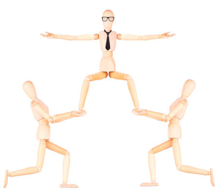 success and winning concept - wooden dummy business teamの写真素材