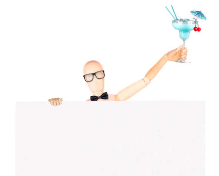 wooden Dummy businessman with banner and cocktal making toast  Isolatedの写真素材