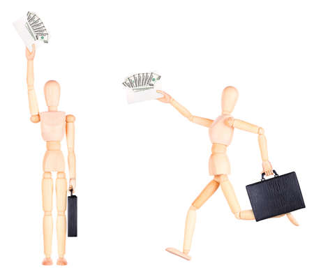 wooden Dummy with case and envelope full of money Isolated on a white backgrondの写真素材