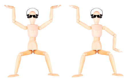wooden Dummy with Headphones Isolated Over White Backgroundの写真素材