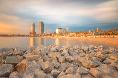 Barceloneta Beach in Barcelona at sunriseの写真素材