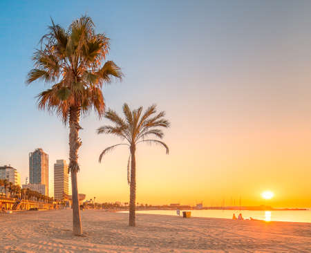 Barceloneta Beach in Barcelona at sunriseの写真素材