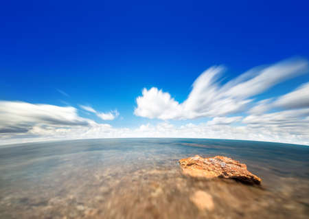 perfect sky and water of oceanの写真素材