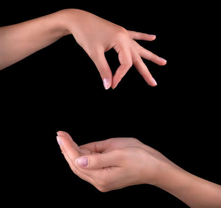 woman hand pick up objectの写真素材